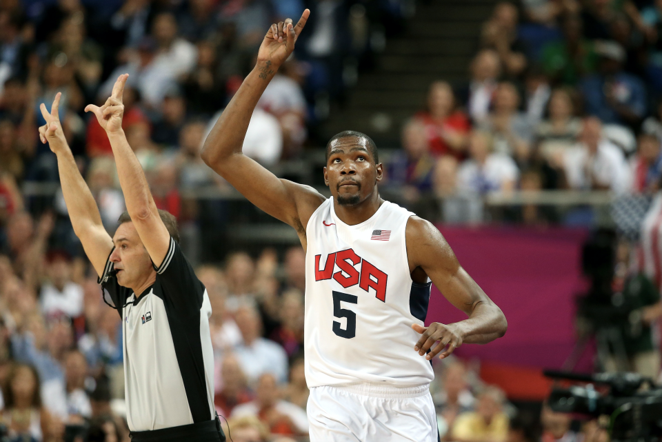 Kevin Durant #5 of the United States celebrates making a three point shot during the Men's Basketball gold medal game between the United States and Spain on Day 16 of the London 2012 Olympics Games at North Greenwich Arena on August 12, 2012 in London, England. (Photo by Christian Petersen/Getty Images) 