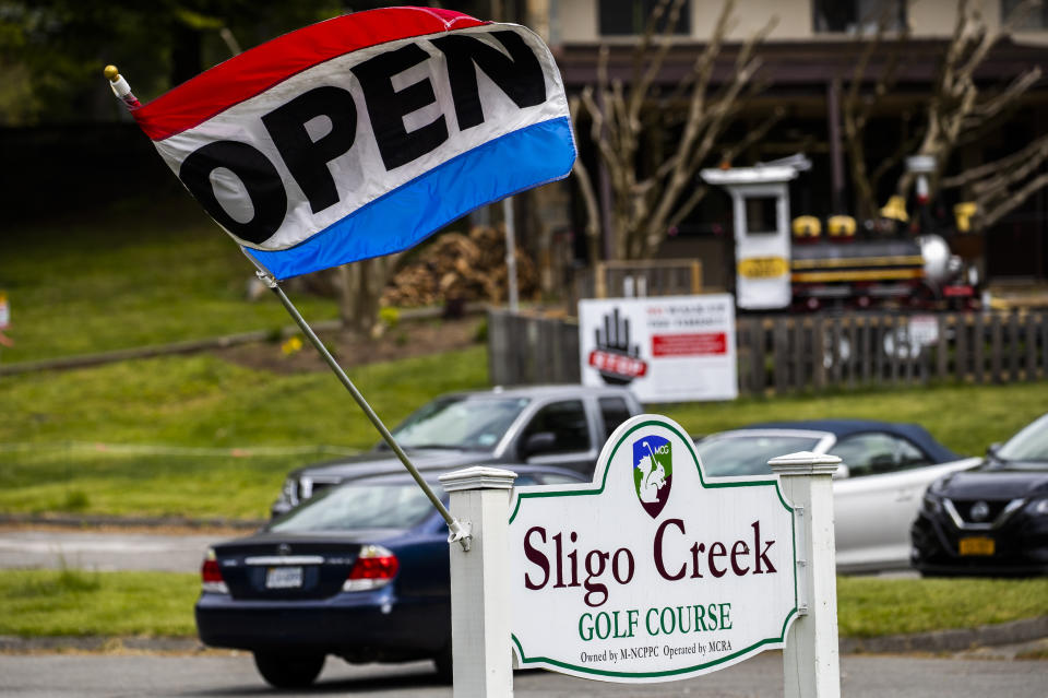 The Sligo Creek Golf Course in Silver Spring, Md., is opened Monday, May 11, 2020, as Maryland Gov. Larry Hogan opened golf courses in the initial stage in easing coronavirus shutdown. As states push for some return to normal business operations, elected officials in the Virginia and Maryland suburbs surrounding Washington, D.C., are unwilling to quickly reopen, as they confront COVID-19 infection and fatality numbers that are the highest in their states. (AP Photo/Manuel Balce Ceneta)