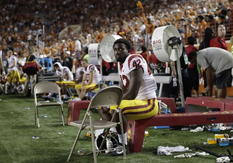 USC linebacker Abdul-Malik McClain (42) sits on the bench during the final seconds of the second half of an NCAA college football game in a 37-14 loss to Texas, Saturday, Sept. 15, 2018, in Austin, Texas. (AP Photo/Eric Gay)