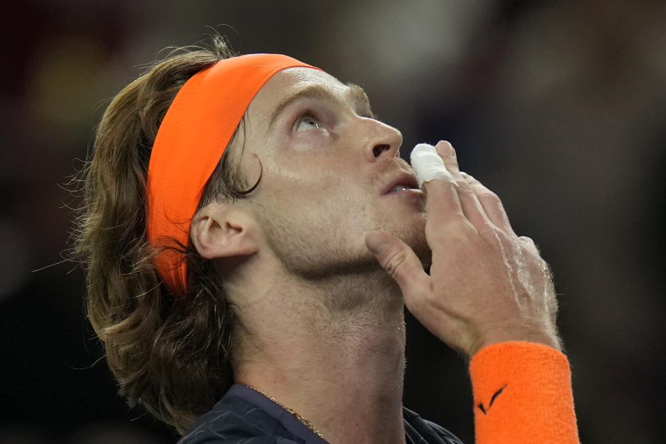 Andrey Rublev of Russia reacts after defeating Ugo Humbert of France in the men's singles quarterfinal match of the Shanghai Masters tennis tournament at Qizhong Forest Sports City Tennis Center in Shanghai, China, Friday, Oct. 13, 2023. (AP Photo/Andy Wong)