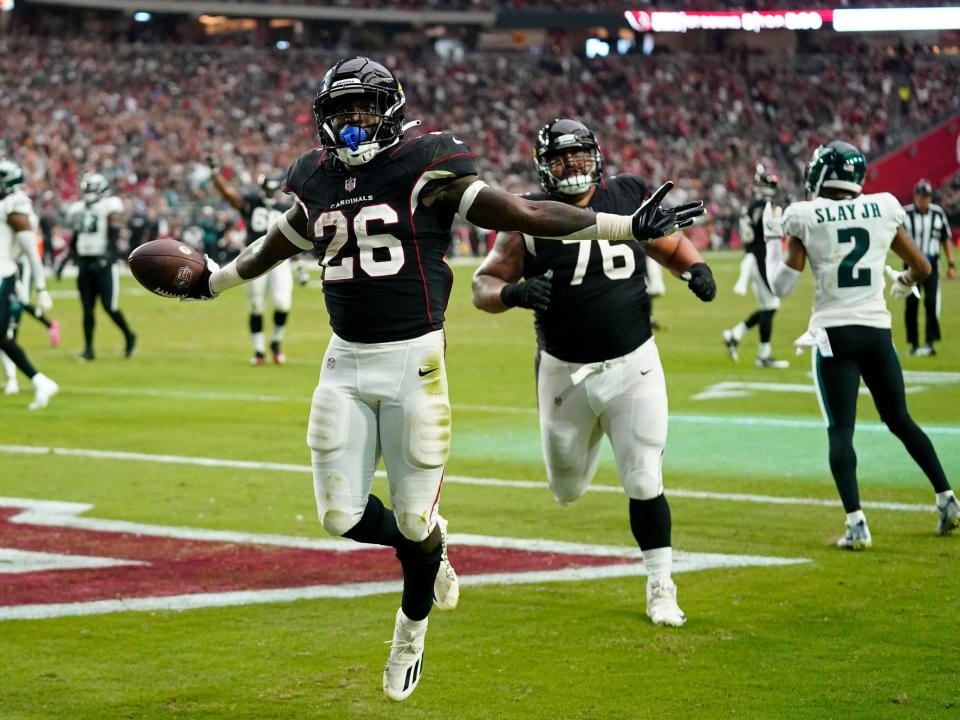 Eno Benjamin celebrates after scoring a touchdown against the Philadelphia Eagles.