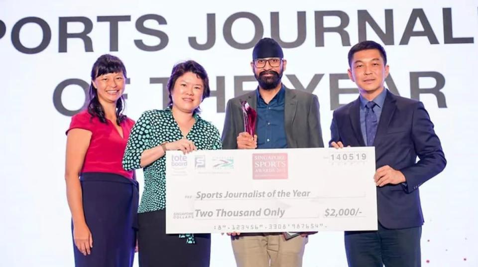 TNP's Dilenjit Singh (second from right) receiving the Sports Journalist of the Year award on 14 May, 2019. (PHOTO: Singapore National Olympic Council via SportSG)