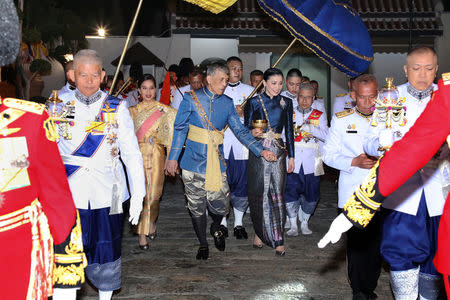 Thailand's King Maha Vajiralongkorn and Queen Suthida attend the ceremony of Assumption of the Royal Residence inside the Grand Palace in Bangkok, Thailand, May 4, 2019. The Committee on Public Relations of the Coronation of King Rama X via REUTERS