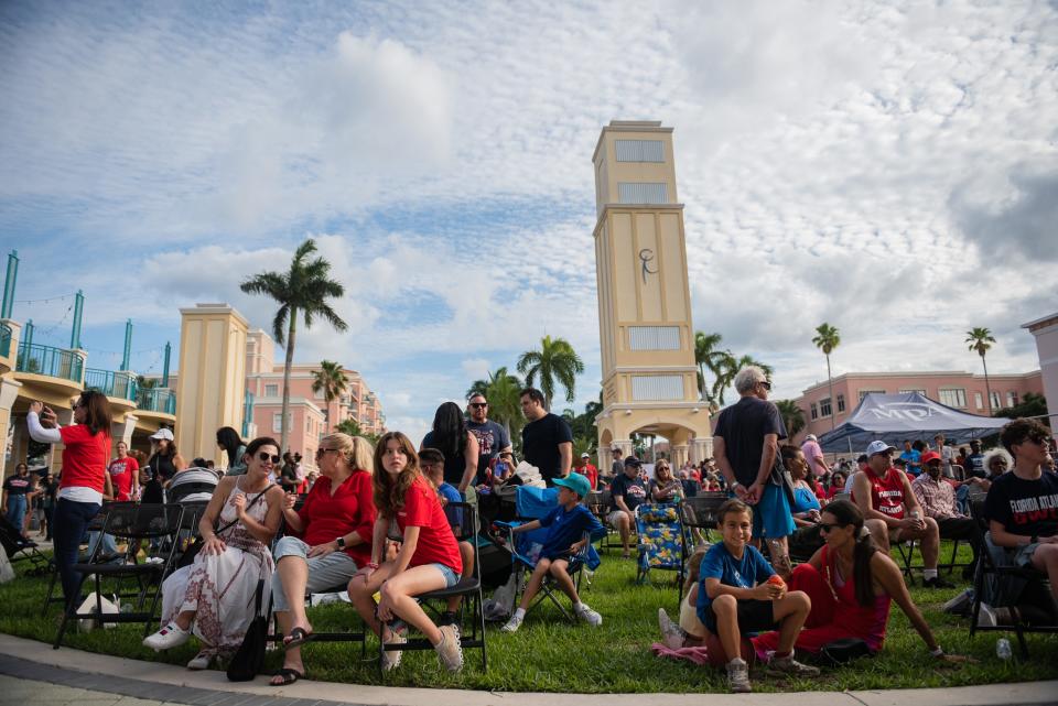 Florida Atlantic fans sit in the Mizner Park Amphitheater seating area on Wednesday, April 19, 2023, in Boca Raton, Fla. Hundreds of Florida Atlantic fans gathered in Mizner Park to celebrate the FAU men's basketball team's accomplishments during the 2022-2023 season, including an appearance in the NCAA Tournament Final Four.