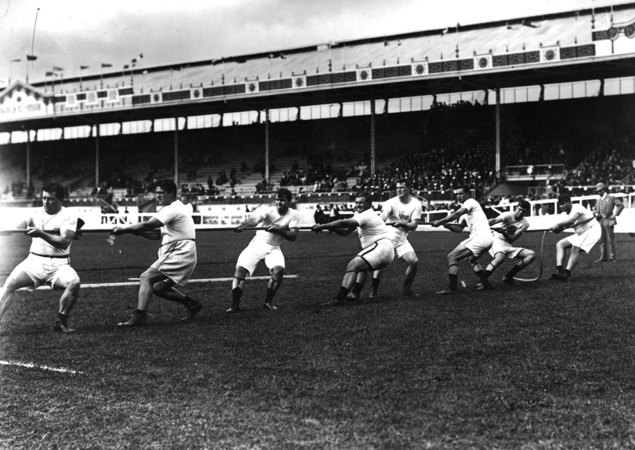 July 1908: The Unites States tug-of-war team in action during the 1908 London Olympics at White City Stadium. (Getty Images)