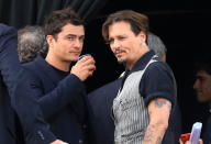 <p>Just two dudes having a drink … except Bloom and Depp happened to be at Disneyland Paris for the premiere of their movie, <i>Pirates of the Caribbean: Dead Men Tell No Tales</i>. (Photo: Best Image/BACKGRID) </p>