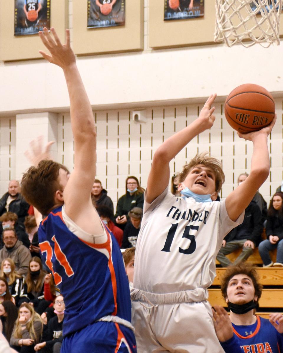 Deacon Judd (15) puts up a shot for Central Valley Academy with Hunter West (21) defending for Oneida during Saturday's Section III playoff game. Judd scored 22 points as Central Valley Academy beat Oneida for the third time this season.
