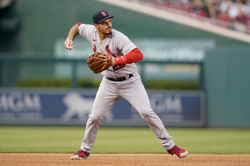 St. Louis Cardinals third baseman Nolan Arenado throws out Washington Nationals' Victor Robles at first base on a groundout in the third inning of a baseball game, Friday, July 29, 2022, in Washington. (AP Photo/Patrick Semansky)