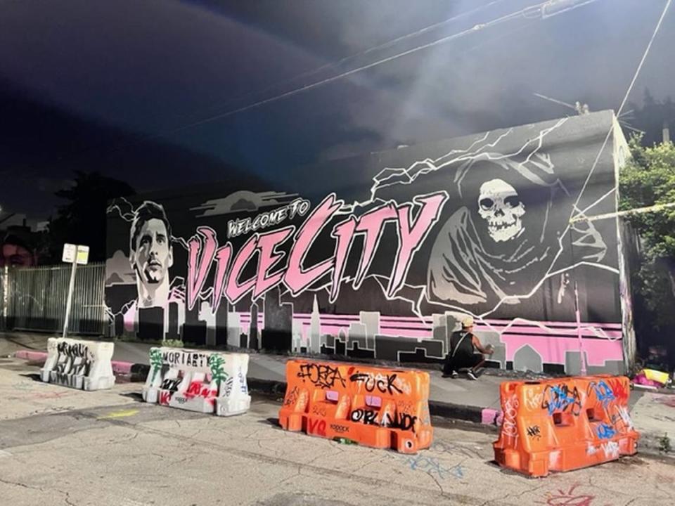 Artist Chris Moramarco and other members of Inter Miami’s Vice City 1896 supporters group restored the Lionel Messi mural that was defaced with purple paint early morning July 26, 2023.