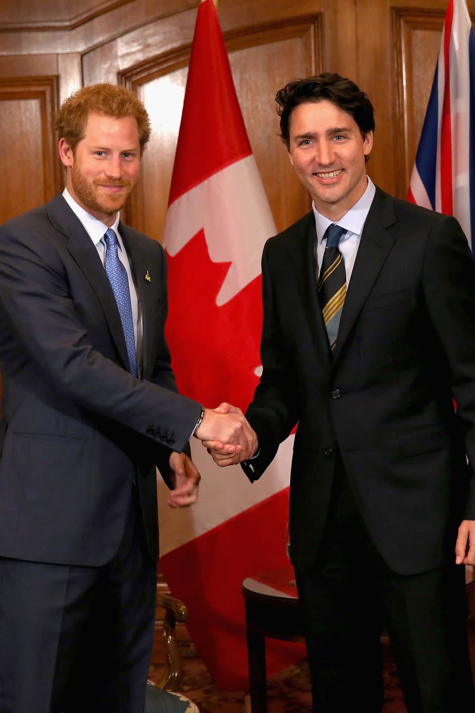 <p>Prince Harry shakes hands with Canadian Prime Minister Justin Trudeau during a meeting in Toronto. </p>