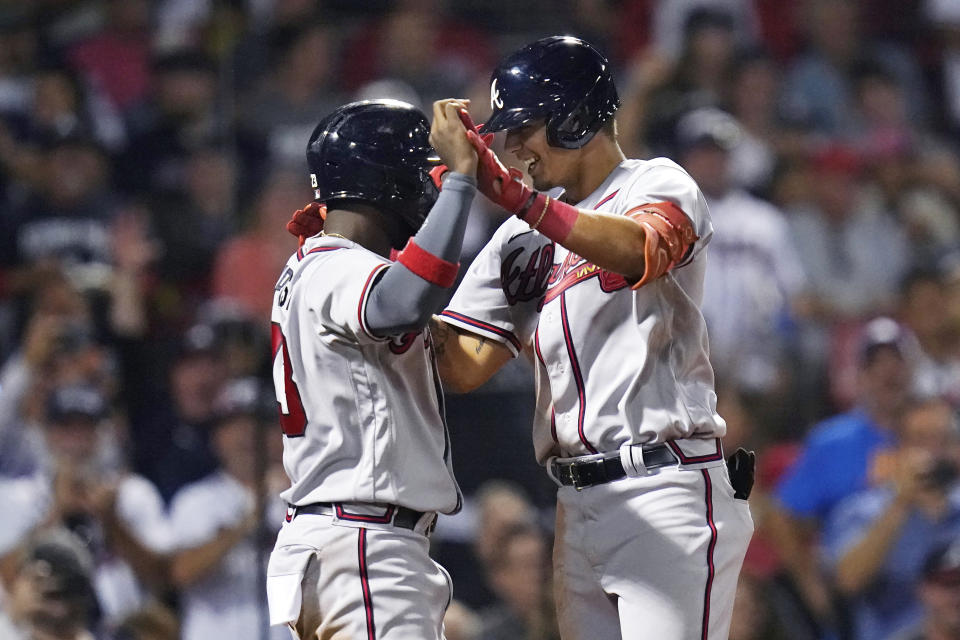 Atlanta Braves' Vaughn Grissom, right, is congratulated by Michael Harris II after his two-run home run against the Boston Red Sox during the seventh inning of a baseball game Wednesday, Aug. 10, 2022, in Boston. (AP Photo/Charles Krupa)