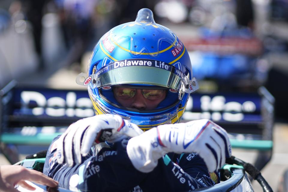 Marcus Ericsson of Sweden, climbs out of his car during a practice session for the IndyCar Grand Prix auto race at Indianapolis Motor Speedway, Friday, May 10, 2024, in Indianapolis. (AP Photo/Darron Cummings)