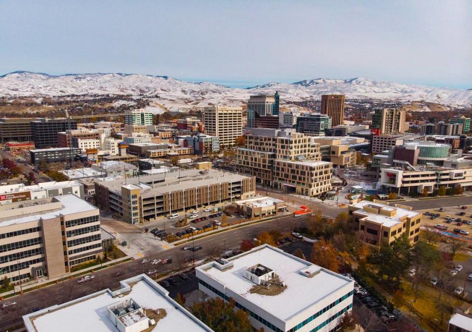 Light snow covers the foothills to the north of Downtown Boise.