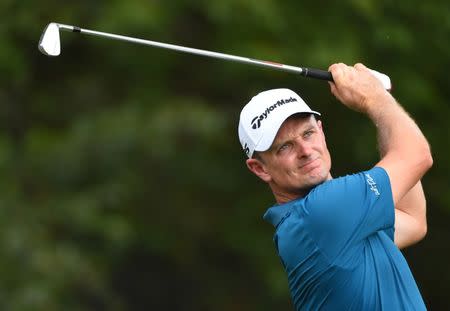 Sep 22, 2018; Atlanta, GA, USA; Justin Rose plays his shot from the third tee during the third round of the Tour Championship golf tournament at East Lake Golf Club. Mandatory Credit: John David Mercer-USA TODAY Sports