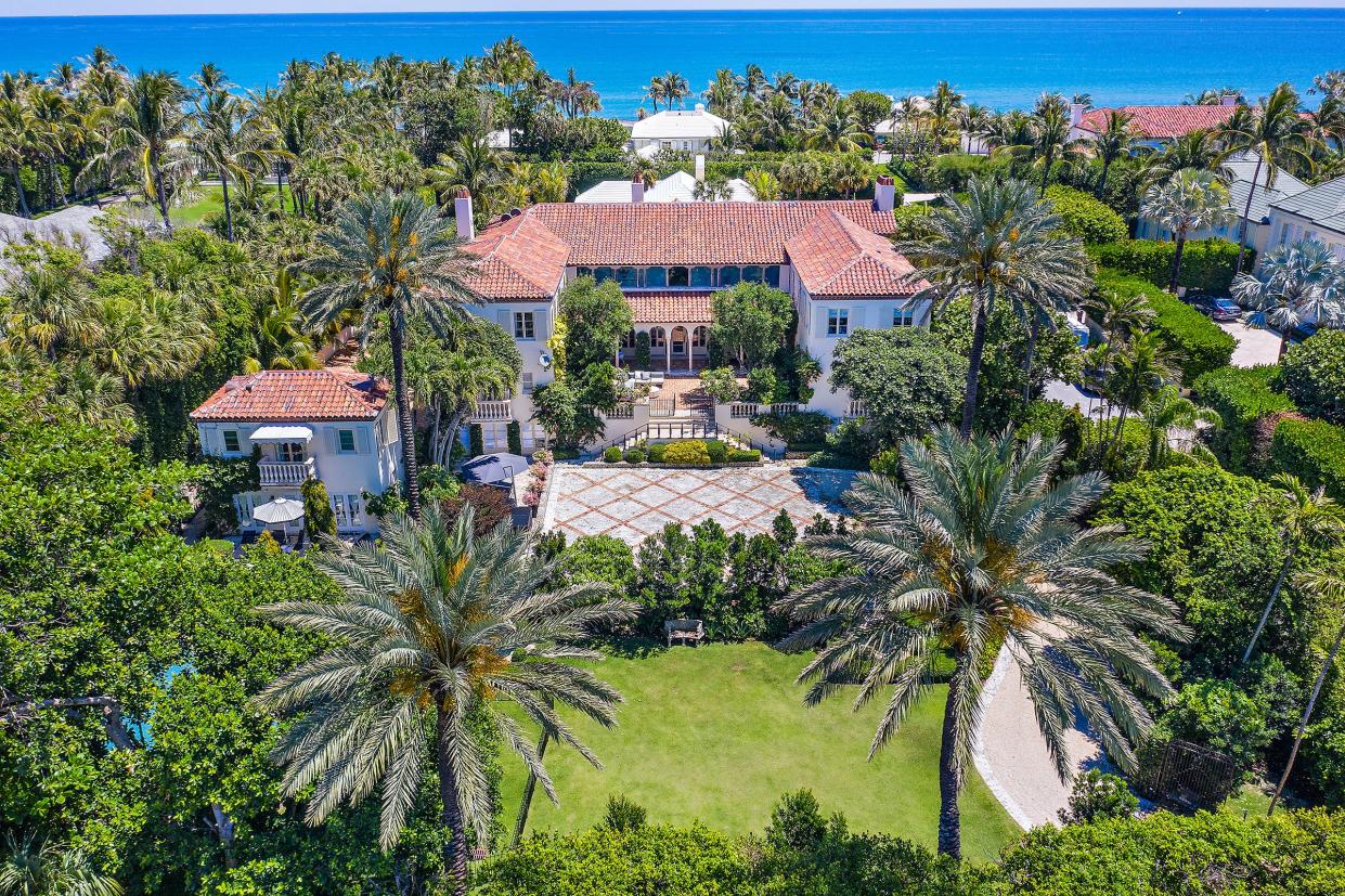 Developer Todd Michael Glaser, who a few years ago renovated and sold this landmarked Palm Beach estate at 125 Via Del Lago, recently bought the property for a recorded $23.286 million. The guesthouse/pool cabana is at the far left.