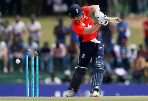 Jonny Bairstow is clean bowled for 26 - Credit: REUTERS/Dinuka Liyanawatte