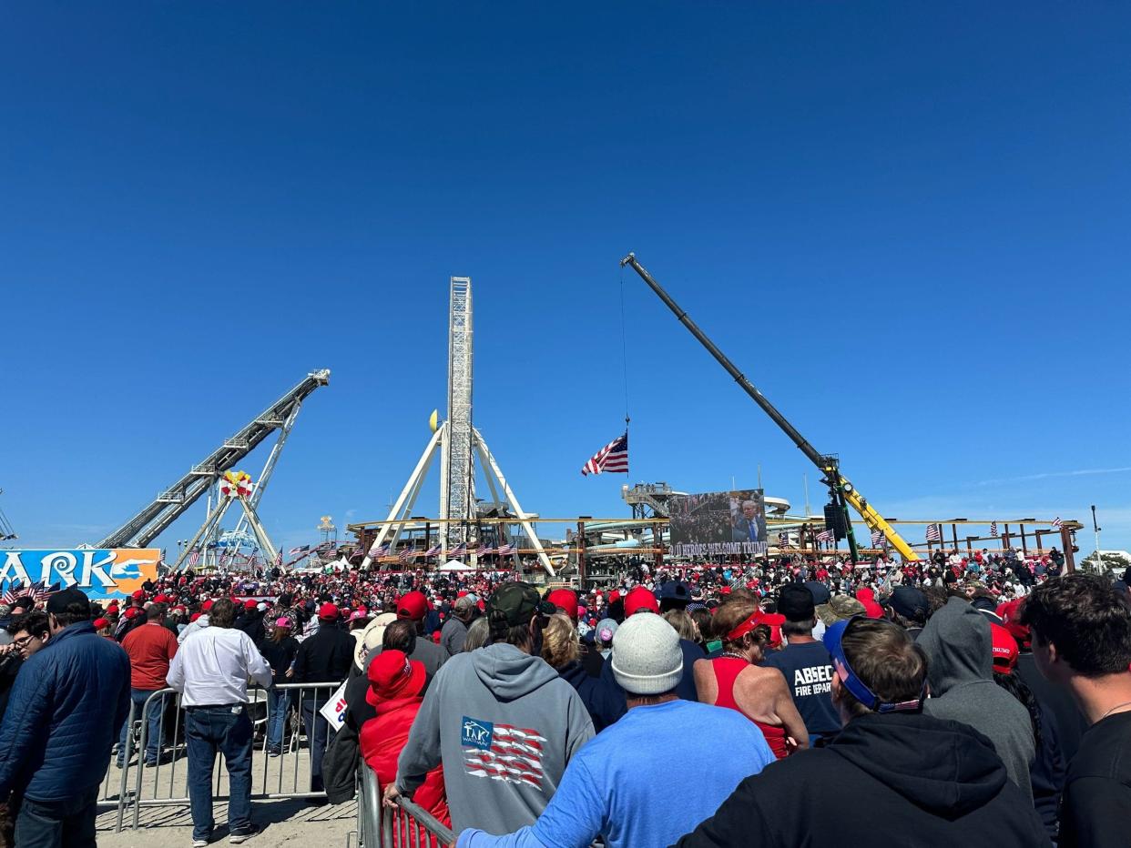 A large crowd lines up prior to former President Trump's campaign rally in Wildwood, Saturday.