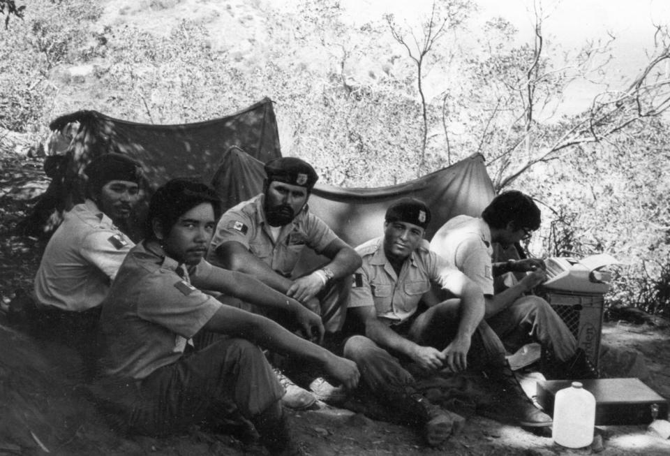 Members of the Brown Berets rest in a campground on Catalina Island in 1972.