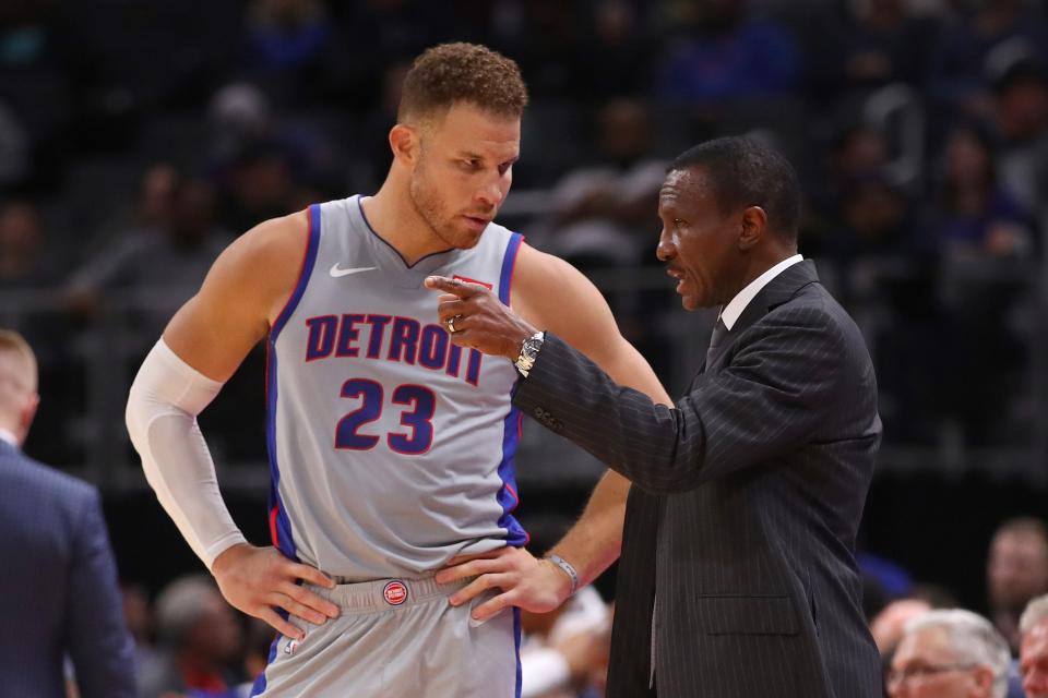 Pistons coach Dwane Casey talks to Blake Griffin while playing Orlando at Little Caesars Arena on Nov. 25, 2019.