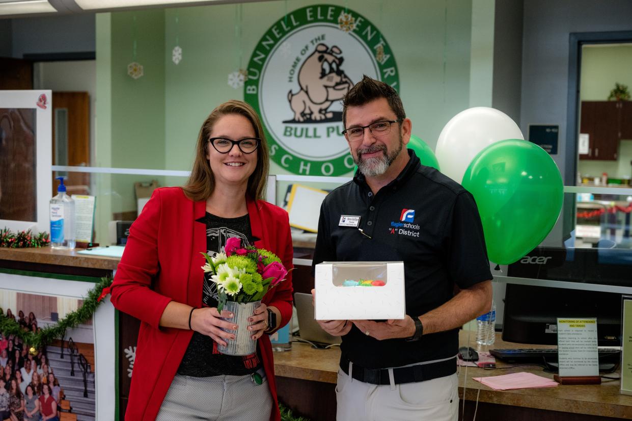 Bunnell Elementary School Assistant Principal Donelle Evensen and Principal Marcus Sanfilippo on Monday, Nov. 28, after being named Flagler Schools Assistant Principal and Principal of the Year.