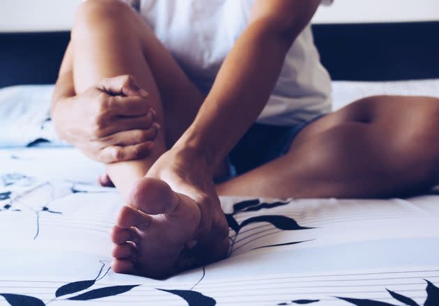 Stretching, icing and strengthening your feet are key to alleviating foot pain. (Photo: Kittima Krammart / EyeEm via Getty Images)