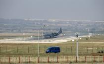 A military aircraft maneuvres on the runway at Incirlik Air Base, southeastern Turkey, on July 28, 2015