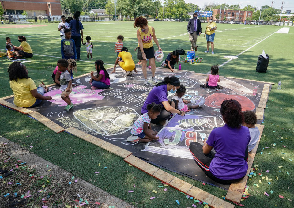 Children and teachers from the KU Kids Deanwood Childcare Center 