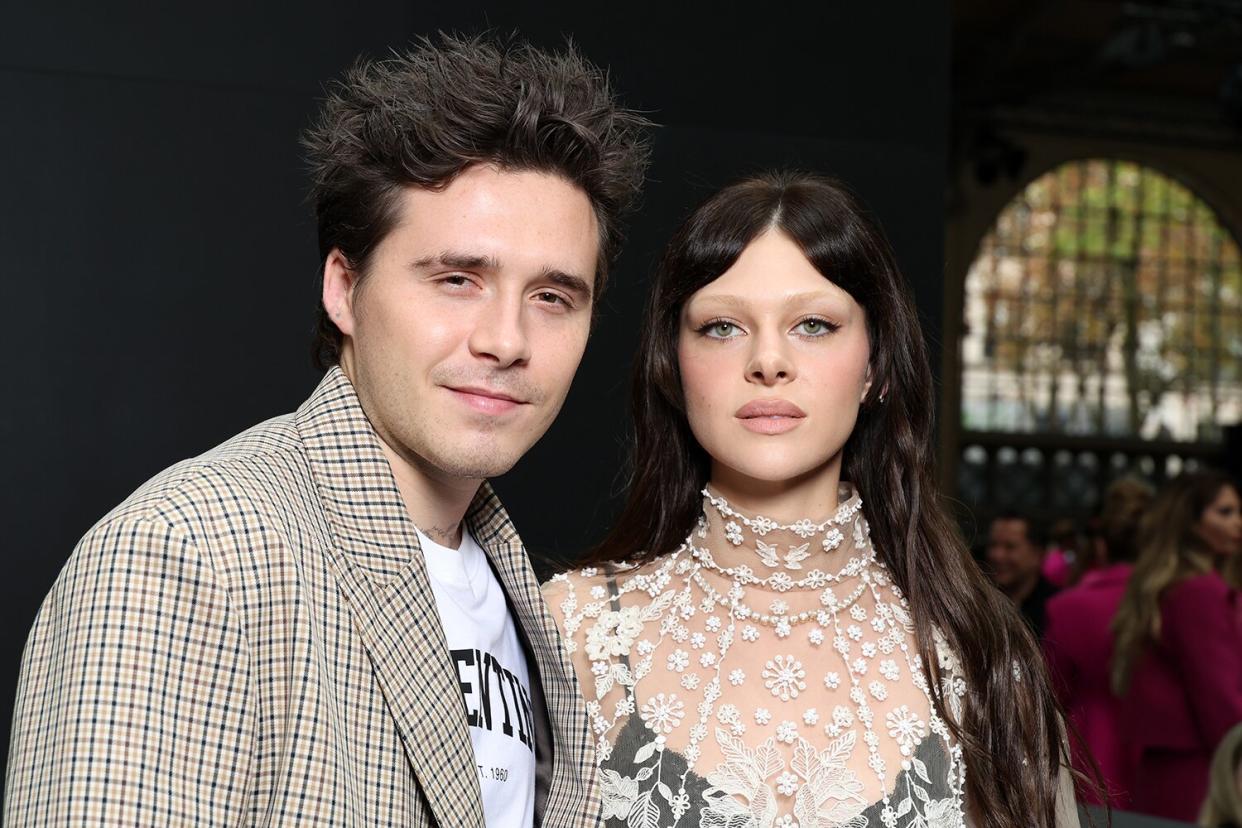 Brooklyn Beckham and Nicola Peltz Beckham attend the Valentino Womenswear Spring/Summer 2023 show