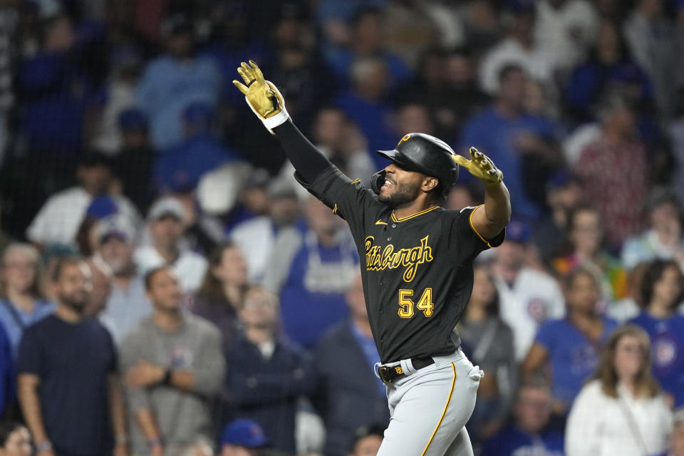 Pittsburgh Pirates' Joshua Palacios celebrates his pinch-hit, three-run home run off Chicago Cubs relief pitcher Julian Merryweather during the ninth inning of a baseball game Thursday, Sept. 21, 2023, in Chicago. (AP Photo/Charles Rex Arbogast)