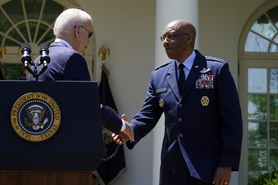 President Joe Biden shakes hands with U.S. Air Force Chief of Staff Gen. CQ Brown, Jr., after nominating Brown as the next Chairman of the Joint Chiefs of Staff, in the Rose Garden of the White House in Washington, Thursday, May 25, 2023. (AP Photo/Susan Walsh)