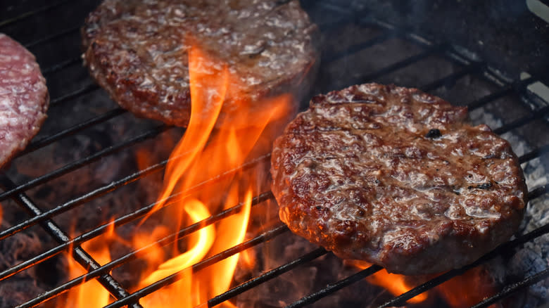 Burgers on charcoal grill