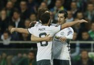 Soccer Football - Saint-Etienne v Manchester United - UEFA Europa League Round of 32 Second Leg - Stade Geoffroy-Guichard, Saint-Etienne, France - 22/2/17 Manchester United's Henrikh Mkhitaryan celebrates scoring their first goal with team mates Action Images via Reuters / Andrew Boyers Livepic