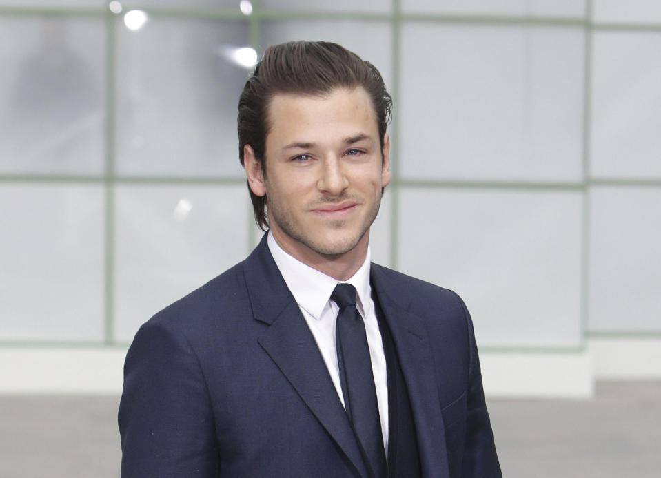 FILE - French actor Gaspard Ulliel arrives for Chanel 's Spring-Summer 2015 Haute Couture fashion collection, presented in Paris, France on Jan. 27, 2015. Ulliel died Wednesday, Jan. 19, 2022, after a skiing accident in the Alps, according to his agent's office. Ulliel, who was 37, was known for appearing in Chanel perfume ads as well as film and television roles. (AP Photo/Thibault Camus, File)