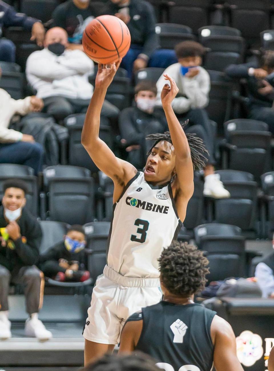 Combine Academy’s Robert Dillingham (3) shoots the 3-point shot during late 1st half action at the Phenom Holiday Classic Wednesday December 23, 2020.