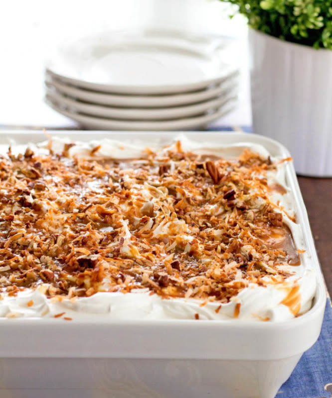 <p>Melissa's Southern Style Kitchen</p><p>This <strong>Salted</strong> <strong>Caramel Coconut Poke Cake</strong> features a buttery vanilla-coconut cake that’s soaked with caramel, then frosted with whipped cream. The top is sprinkled with toasted coconut, pecan pieces and a sprinkle of sea salt to finish. The only thing that trumps the simple preparation is the spectacular flavor combination of caramel, coconut and pecans with a hint of salt.</p><p><strong>Get the recipe: </strong><a href="https://www.melissassouthernstylekitchen.com/salted-caramel-coconut-poke-cake/" rel="nofollow noopener" target="_blank" data-ylk="slk:Salted Caramel Coconut Poke Cake;elm:context_link;itc:0;sec:content-canvas" class="link "><strong>Salted Caramel Coconut Poke Cake</strong></a></p>