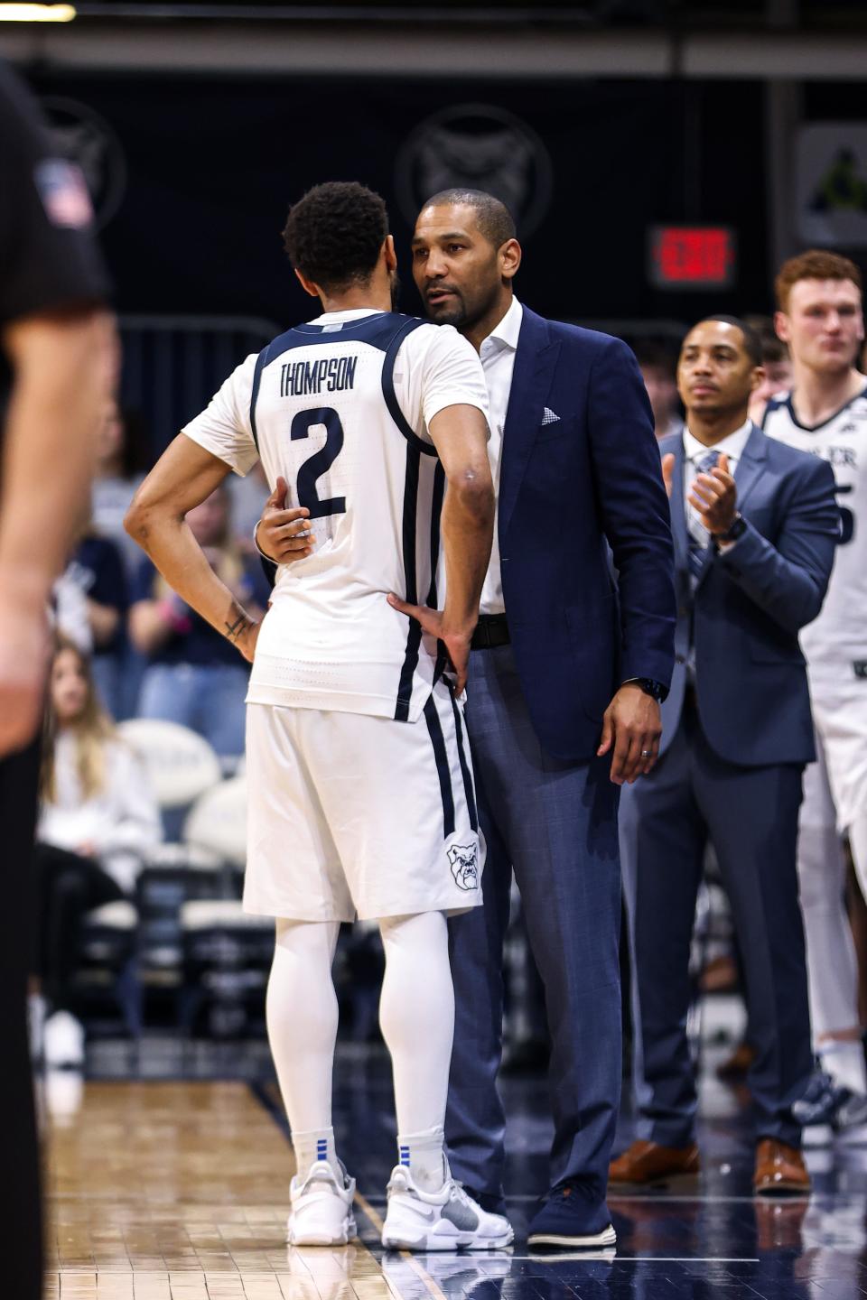 Coach LaVall Jordan of the Butler Bulldogs hugs Aaron Thompson during the second half against the Villanova Wildcats at Hinkle Fieldhouse on March 05, 2022 in Indianapolis, Indiana.