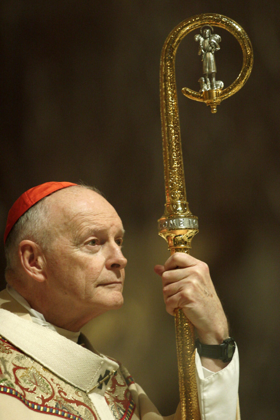 Cardinal Theodore McCarrick, Archbishop of Washington, listens to a reading at the Cathedral of St. Matthew on March 24, 2005 in Washington, D.C. McCarrick also performed a foot-washing as part of Holy Week celebrations. | Chip Somodevilla—Getty Images