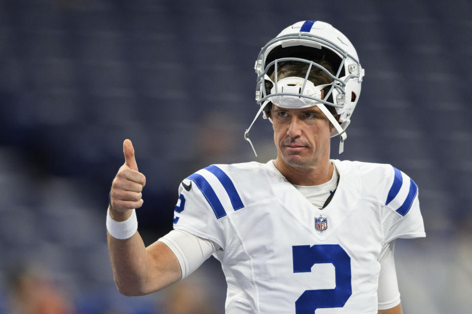 FILE - Indianapolis Colts quarterback Matt Ryan (2) gives a thumbs up to a fan before an NFL football game against the Detroit Lions, Saturday, Aug. 20, 2022, in Indianapolis. Colts quarterback Matt Ryan expects to see his most extensive preseason action against a familiar foe. Tampa Bay quarterback Tom Brady is scheduled to make his preseason debut on a familiar field. Yes, the two guys who finished the 2016 season by starting in the Super Bowl are are expected to square off again in Saturday's preseason finale. (AP Photo/Zach Bolinger, File)