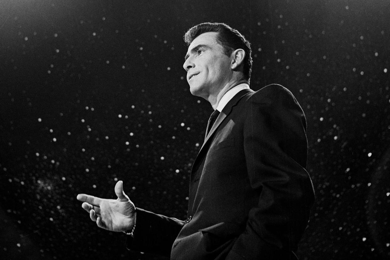 <span>Rod Serling introduces an episode of ‘The Twilight Zone’ in Culver City, California, on 23 January 1962.</span><span>Photograph: CBS Photo Archive/Getty Images</span>