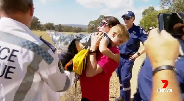 James Skillen was reunited with his family after spending the night lost in NSW bushland. Source: 7 News