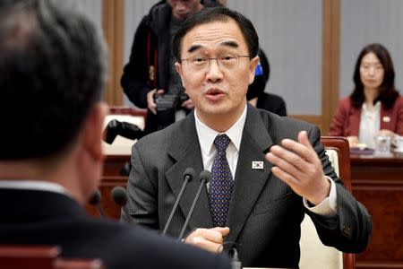 South Korean Unification Minister Cho Myoung-gyon talks with North Korea's Ri Son Gwon, chairman of the Committee for the Peaceful Reunification of the Country, during their meeting at the truce village of Panmunjom inside demilitarized zone, South Korea, October 15, 2018. Korea Pool/Yonhap via REUTERS