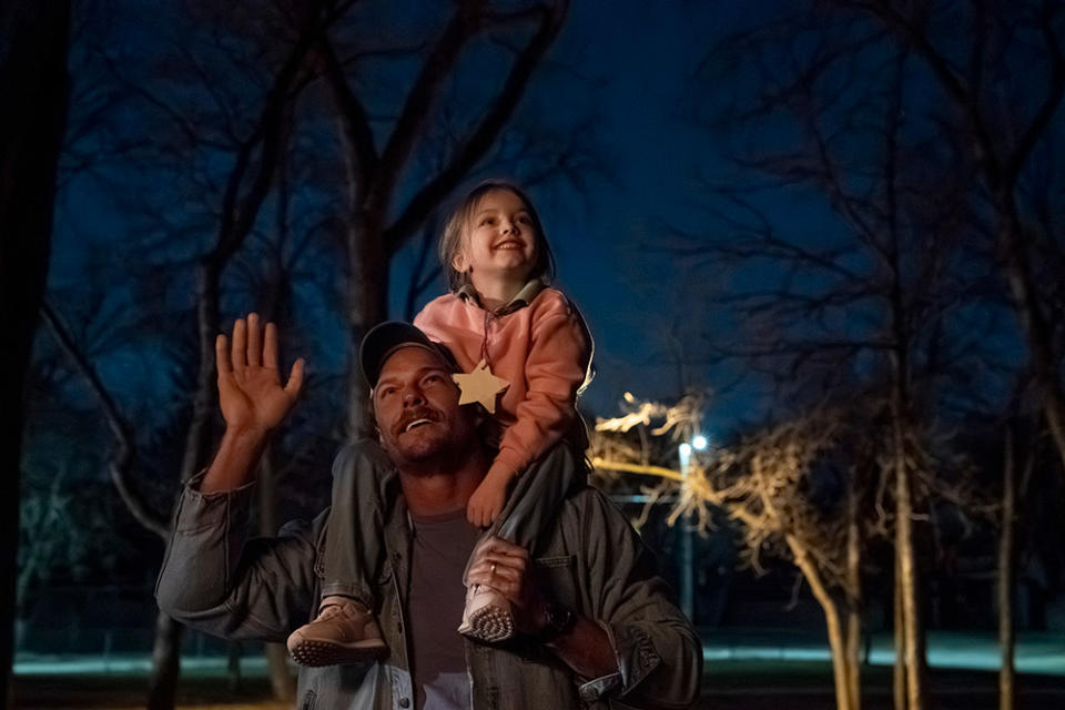 Alan Ritchson with Emily Mitchell in Ordinary Angels