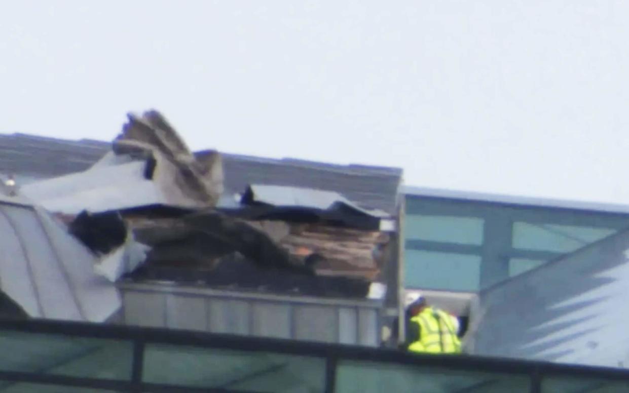 Part of the roof structure was peeled back as it was struck by gusts of wind