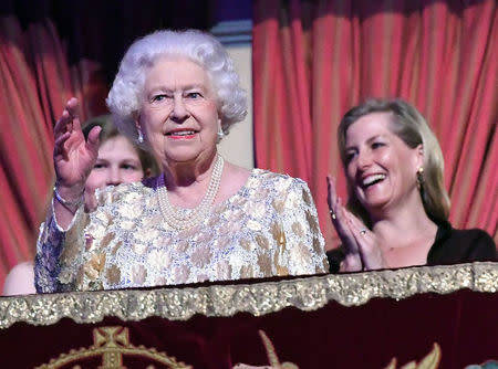 Britain's Queen Elizabeth waves during a special concert "The Queen's Birthday Party" to celebrate her 92nd birthday at the Royal Albert Hall in London, Britain April 21, 2018. Andrew Parsons/Pool via Reuters