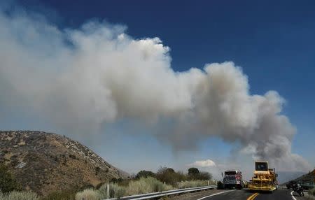 Smoke from the Lytle Creek area is seen from the so-called Blue Cut Fire in the San Bernardino National Forest in San Bernardino County, California, U.S. August 18, 2016. REUTERS/Gene Blevins