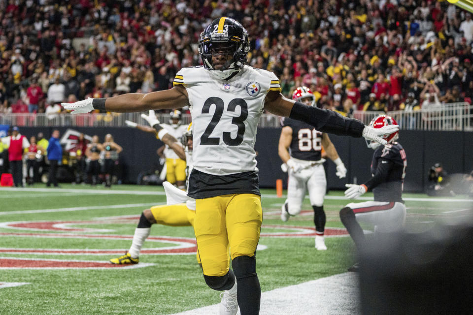 FILE - Pittsburgh Steelers safety Damontae Kazee (23) celebrates during the second half of an NFL football game against the Atlanta Falcons, Dec. 4, 2022, in Atlanta. Kazee signed a two-year deal to remain in Pittsburgh on Tuesday, April 4, 2023. (AP Photo/Danny Karnik, File)