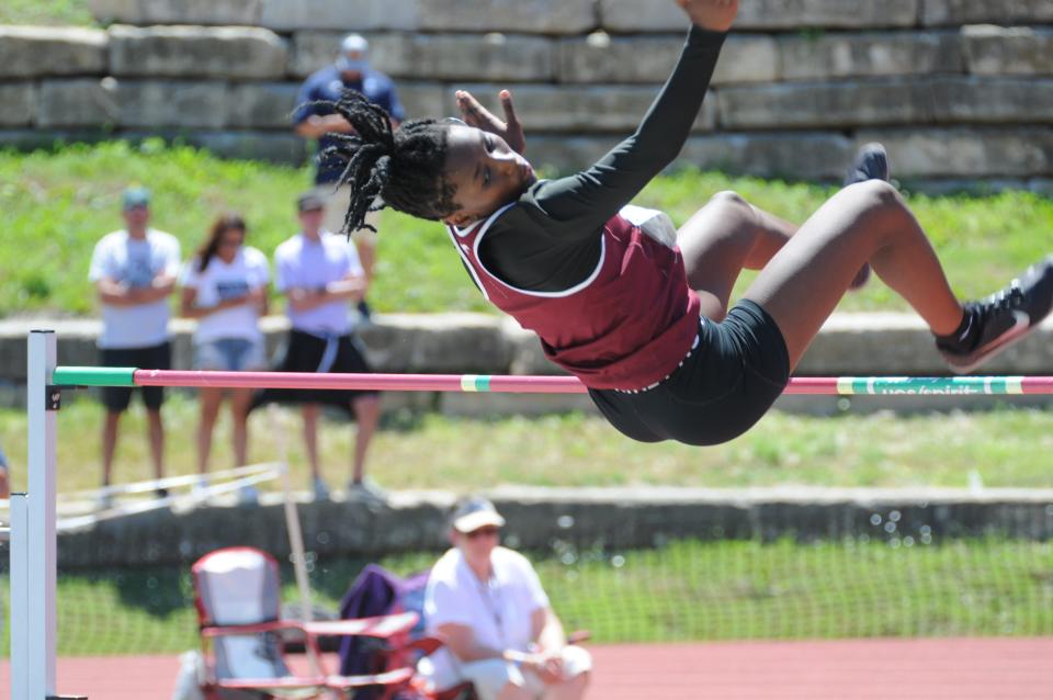 Salina Central's Mykayla Cunningham clears a height during the high jump of the Class 5A state track and field championships Friday, May 27, 2022 at Cessna Stadium in Wichita.