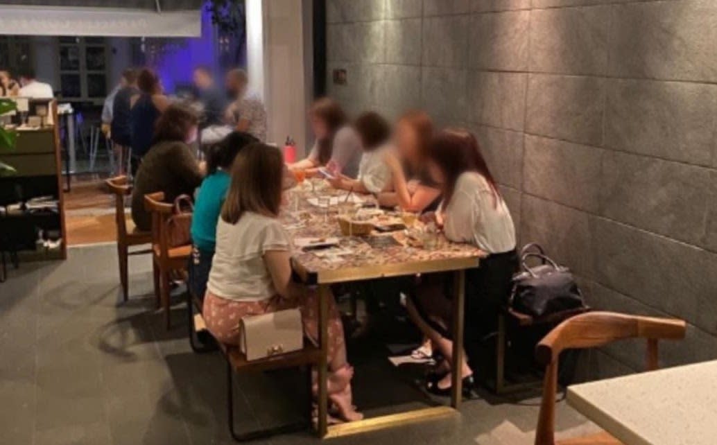 A group of seven patrons were found seated at a table at a Duxton Hill restaurant on 25 September 2020. (PHOTO: Urban Redevelopment Authority)  