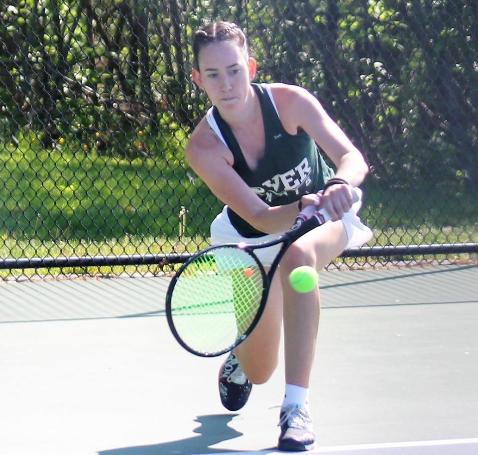 Dover's Taylor Wilson prevailed at No. 1 singles Tuesday during the Green Wave's semifinal match against Hanover.