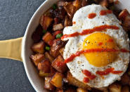 <div class="caption-credit"> Photo by: Photo by Sarah Flotard</div><b>Chicken Hash with Sriracha</b> <br> <br> Cook 1-2 slices bacon in a skillet with a diced small onion until onion is tender. Add chopped cooked potatoes and cook until bacon and potatoes are brown and crisp. Add a handful of shredded chicken and a dash of reduced-sodium soy sauce. Continue to cook until chicken is just warmed through. Sprinkle hash with chopped scallions and season to taste with freshly ground black pepper. Top each serving with a fried egg and a few shakes of Sriracha.